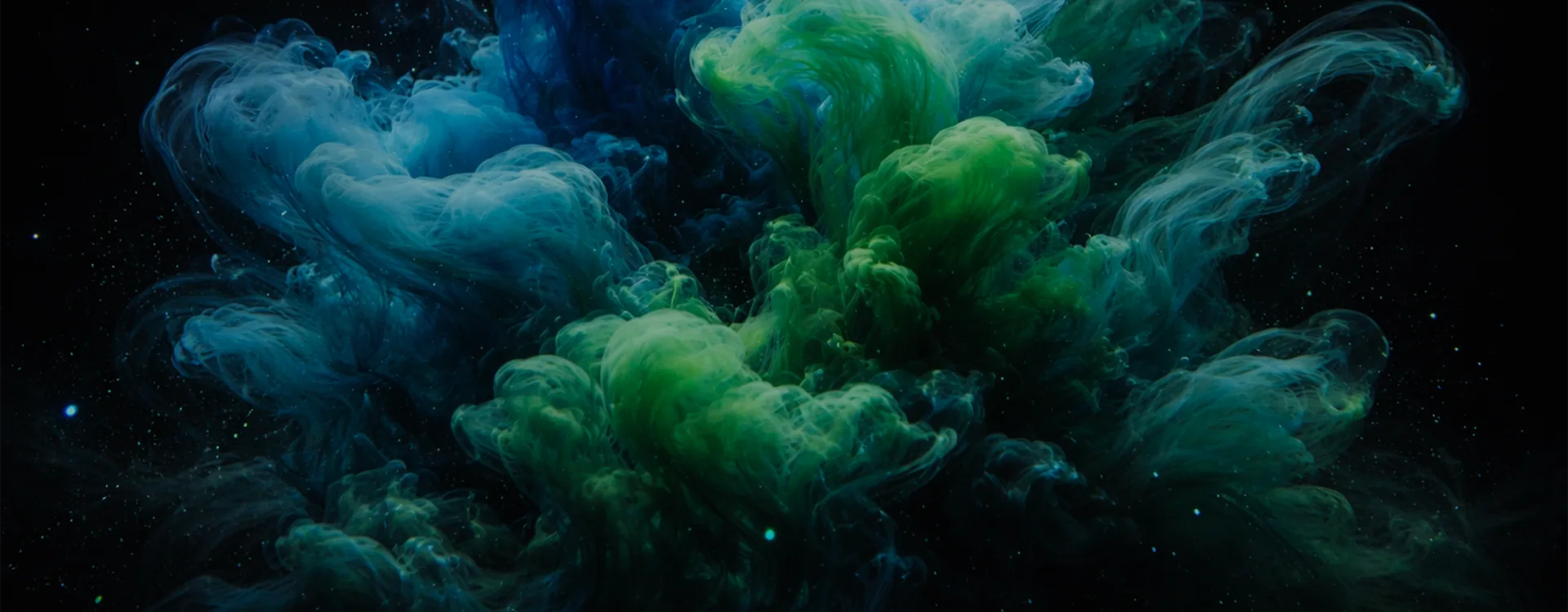 Blue and green smoke evoking strategic transformation